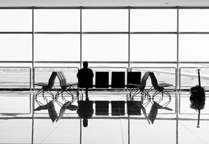 Photo of a man sitting at the airport