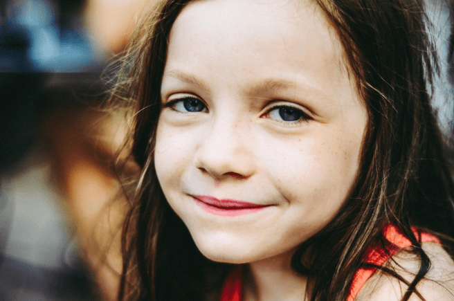upclose photo of a smiling girl