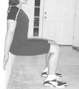 woman doing a wall sit