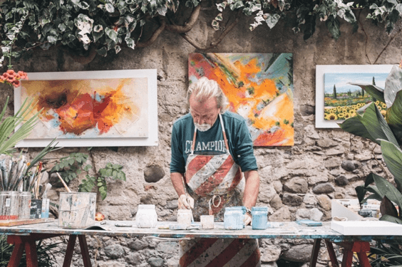 photo of an older man painting